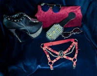 a pair of shoes, a purse, and a pair of sunglasses